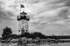 American Flag by Ladies Delight Lighthouse in Maine - BW